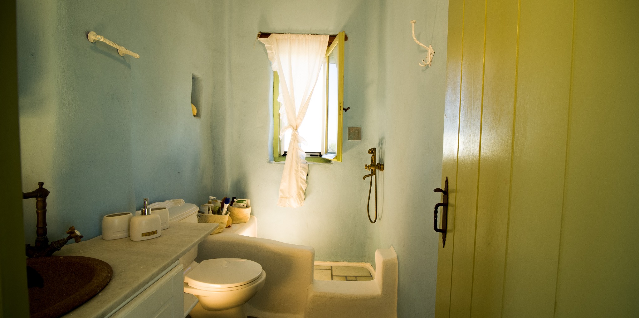 Lithos Private Estate blue bathroom angle
