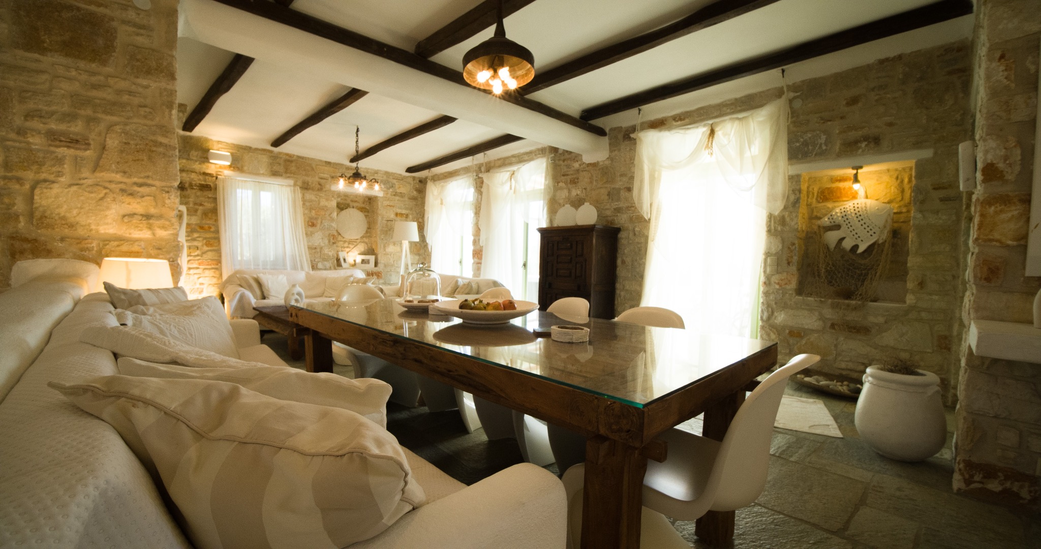 Lithos Private Estate dining table and lounge seating