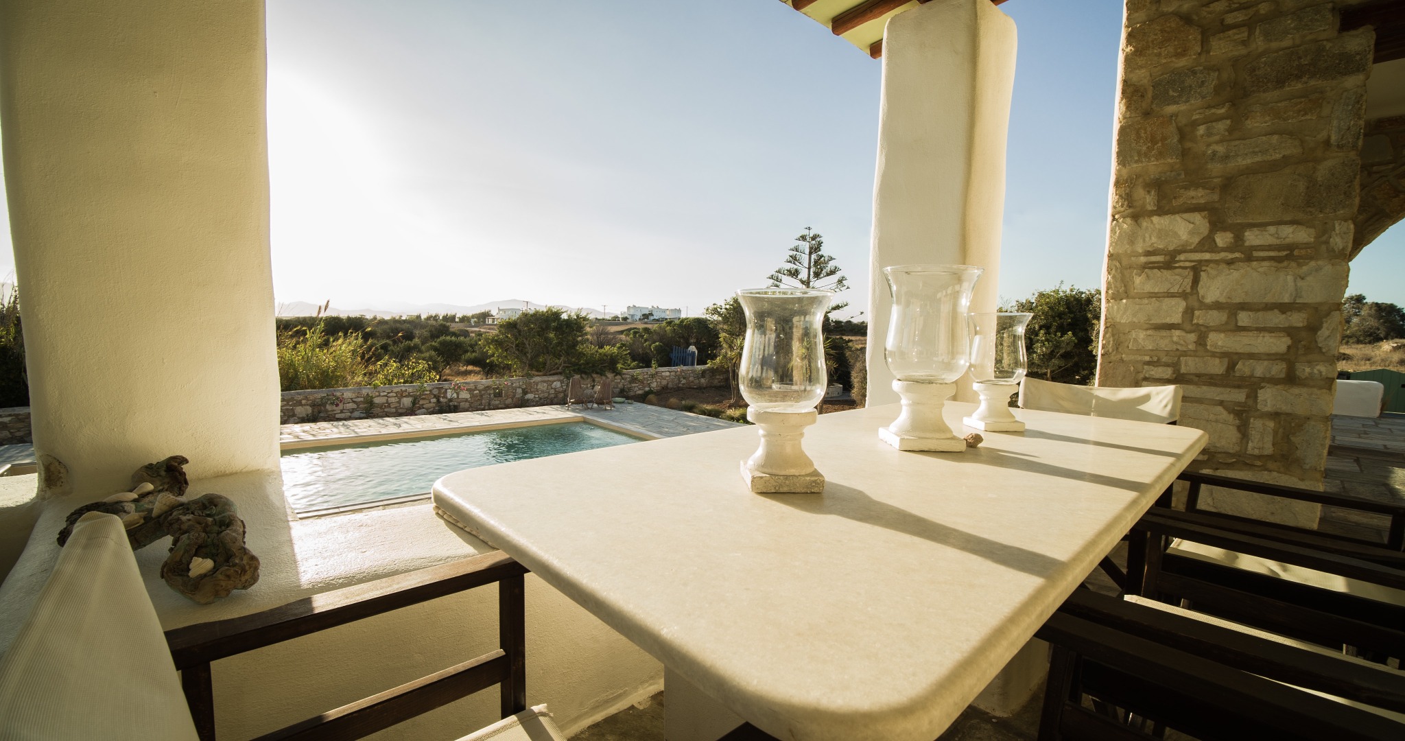 Lithos Private Estate dining terrace overlooking the pool