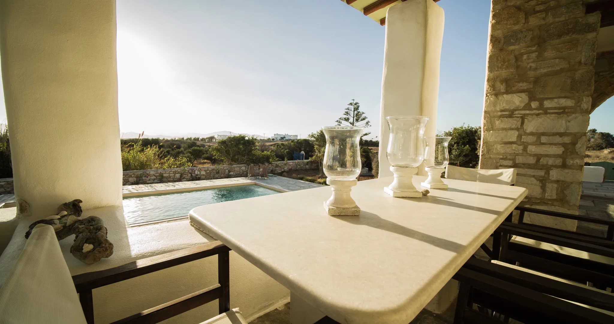 Lithos Private Estate dining terrace overlooking the pool