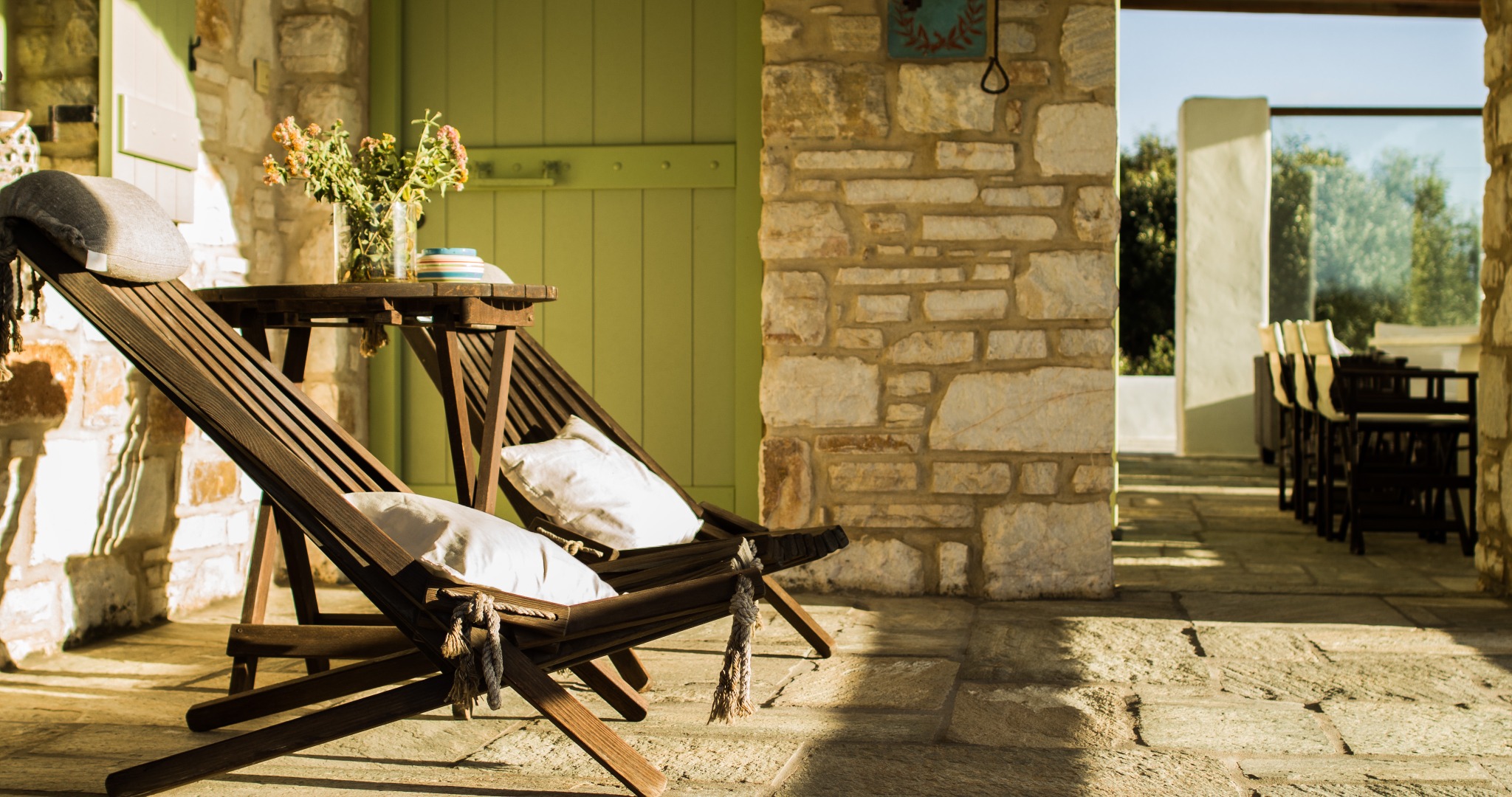 Lithos Private Estate shaded outdoor lounge and dining