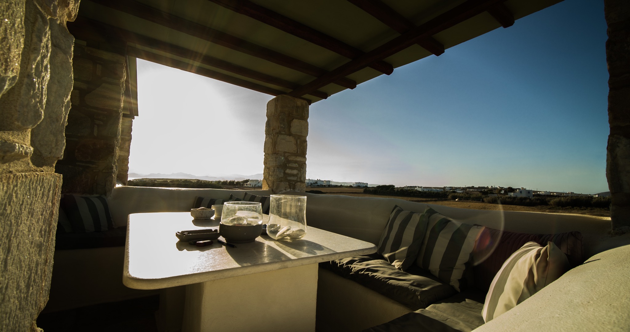 Lithos Private Estate golden-hour terrace scene