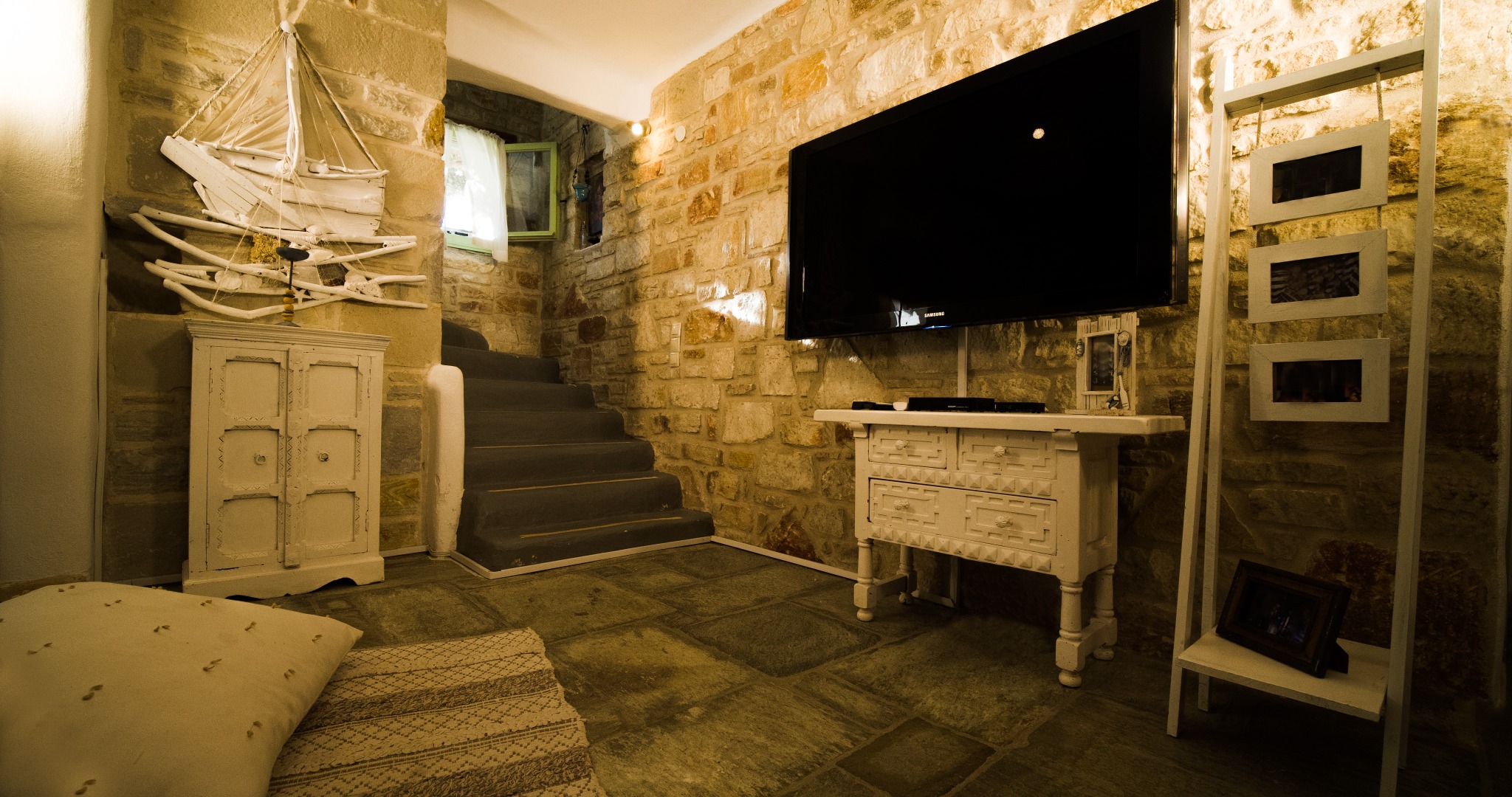 Lithos Private Estate TV room and stairs